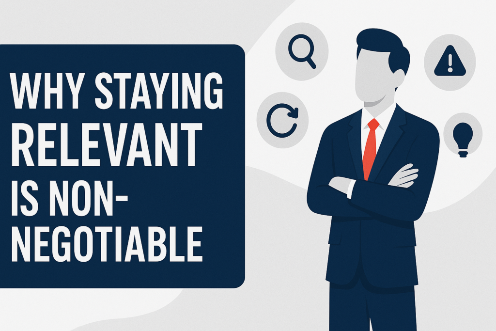 “Why Staying Relevant Is Non-Negotiable” displayed in bold white type on a solid dark-blue panel at left; to the right, a flat-style figure of a man in a navy suit and red tie stands with arms crossed against light-gray abstract shapes. Surrounding him are four dark-blue icons—magnifying glass (search), circular arrow (adaptation), warning triangle (risk), and light bulb (innovation)—conveying the need for continual learning and adaptation.